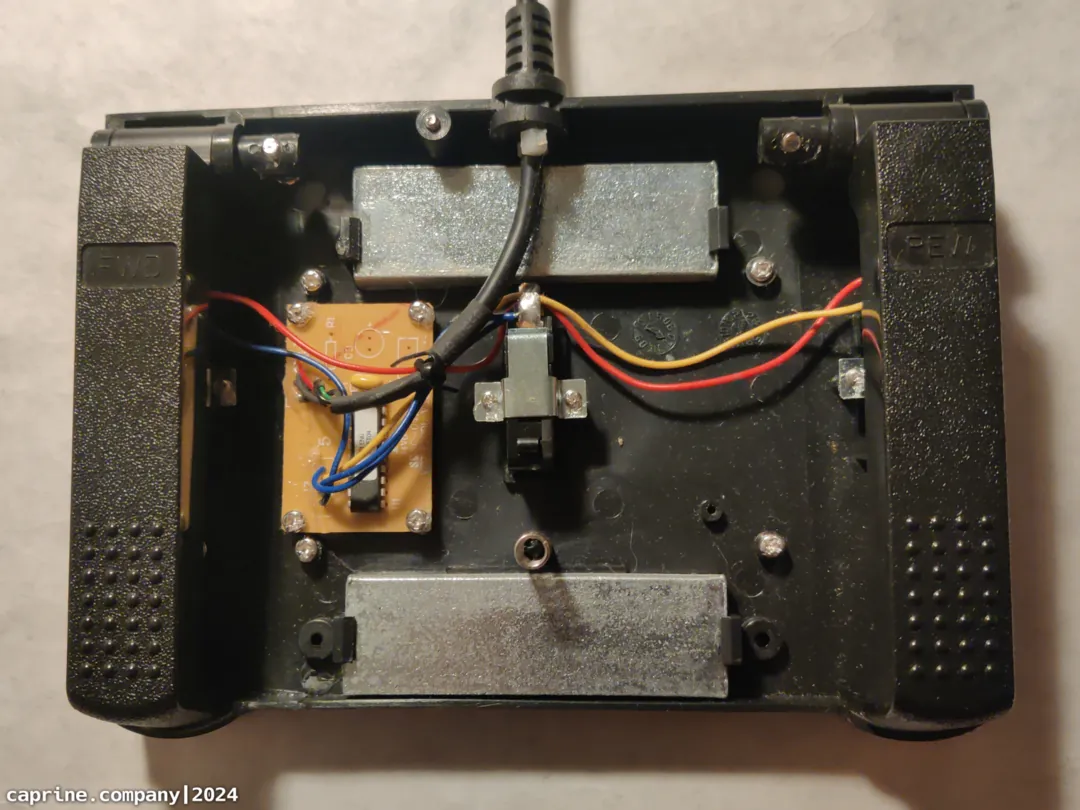 Image of the foot pedal internals before modification.